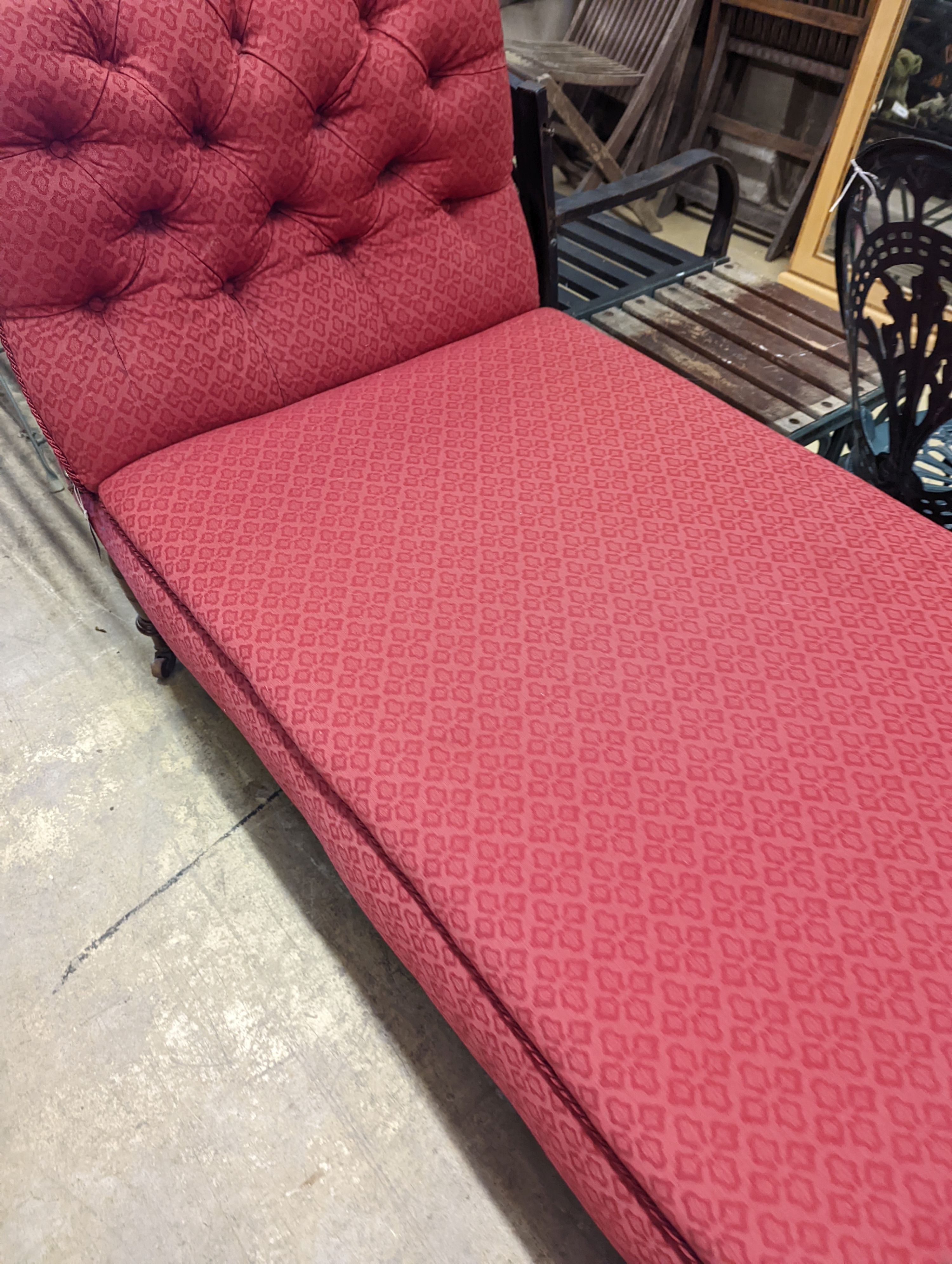 A Victorian mahogany drop arm daybed upholstered in buttoned red fabric, length 160cm, depth 70cm, height 96cm
